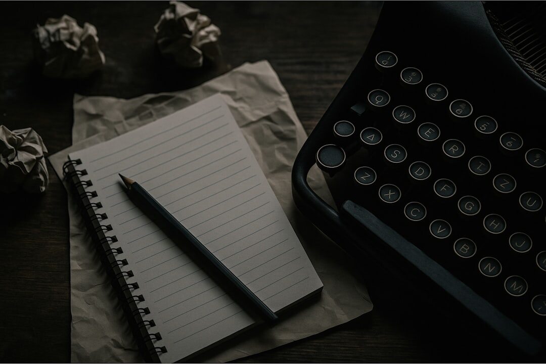 writer at desk with notebook