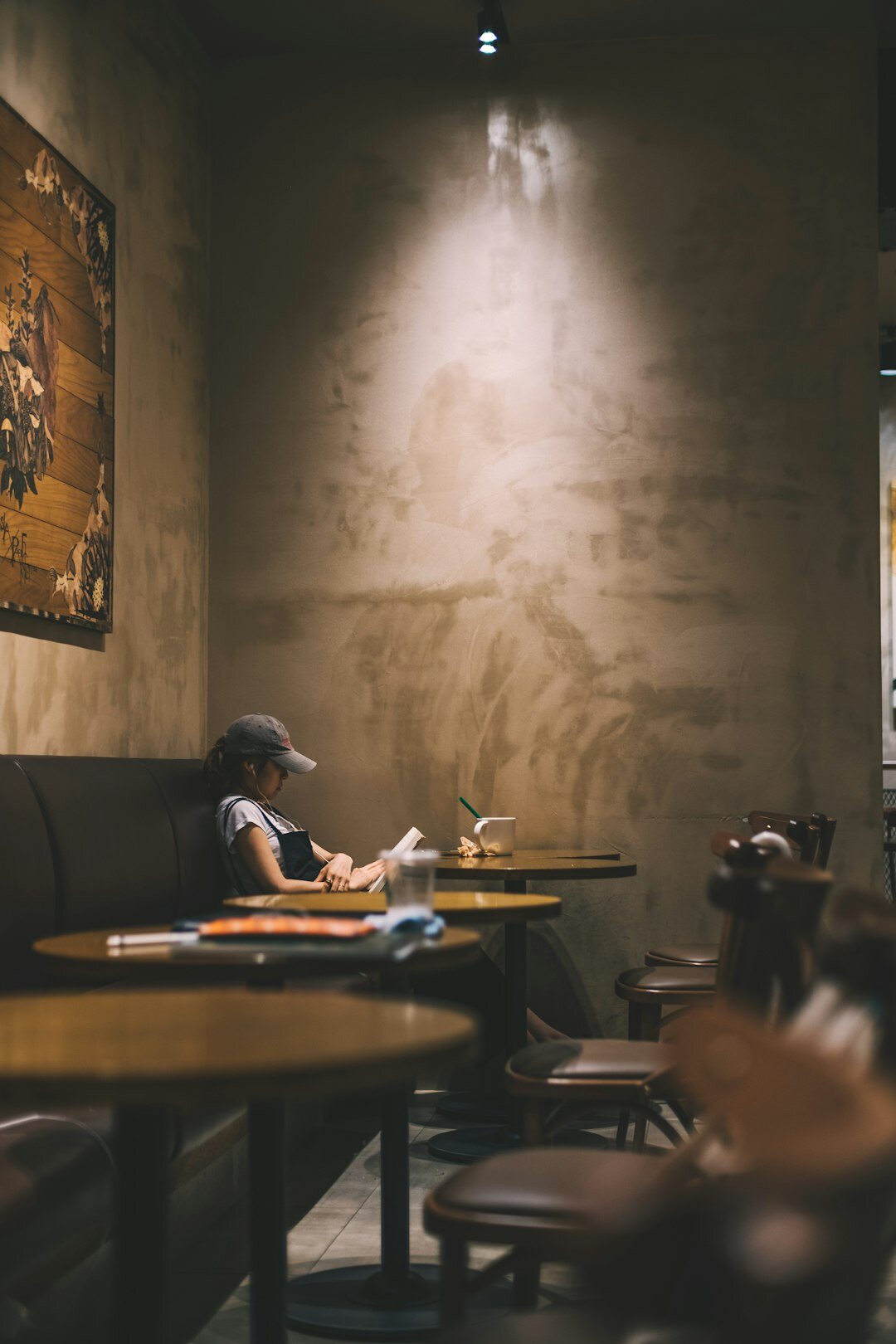 author writing in cafe